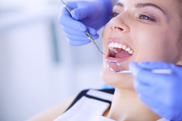 woman getting her teeth cleaned